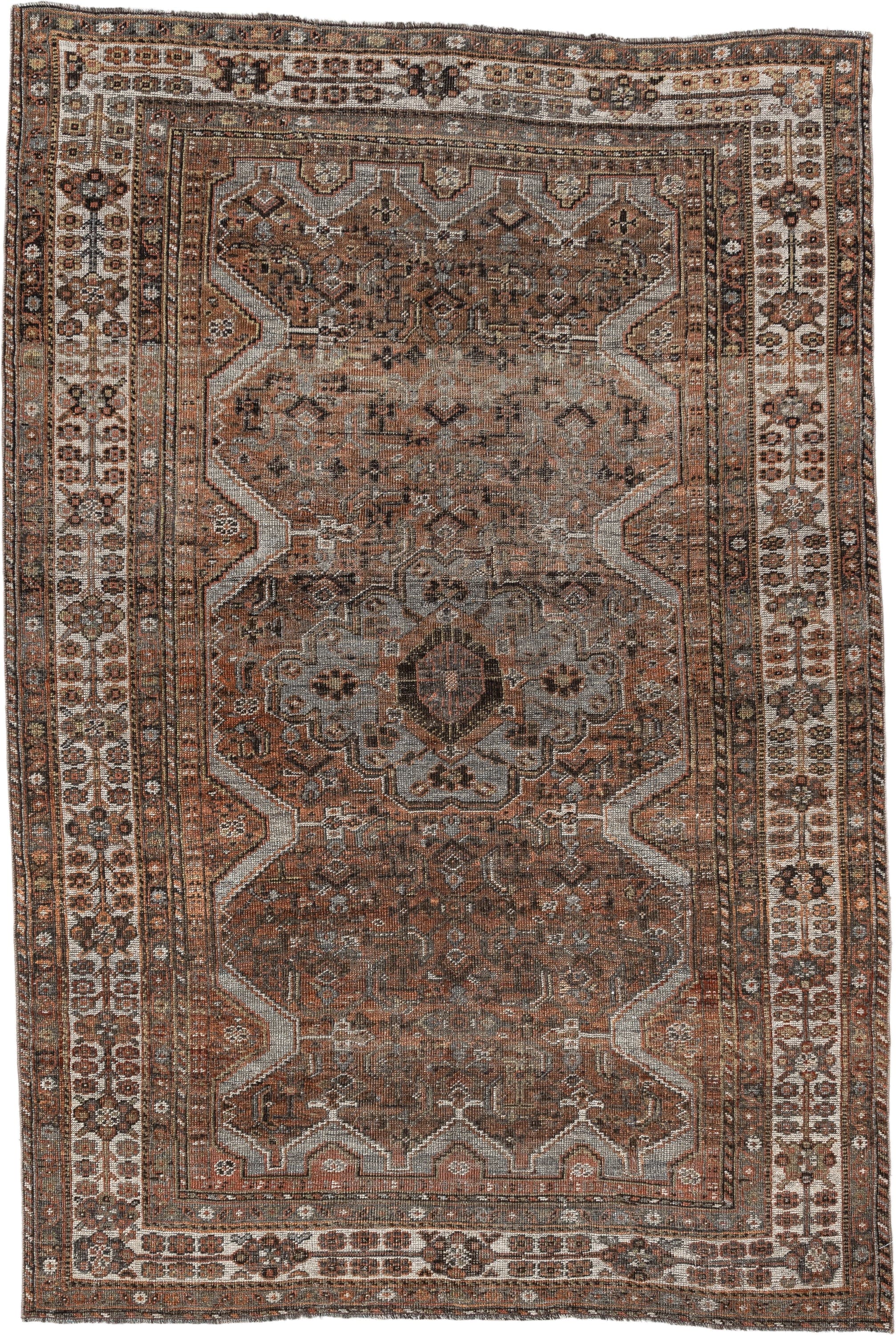 5' x 7' one-of-a-kind handmade antique Shiraz medium size rug. Color palette: rust, brown, ivory, taupe, charcoal, camel