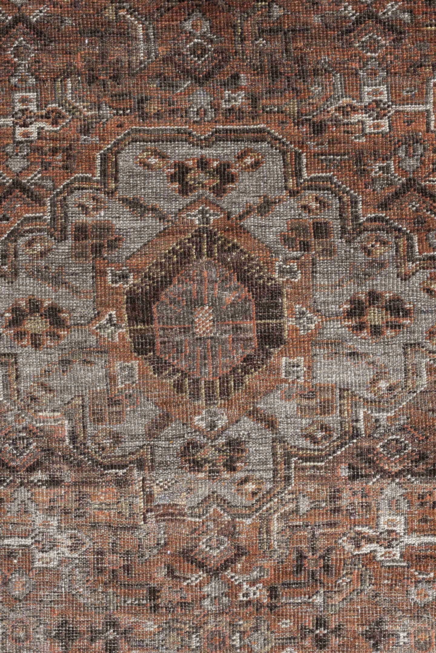 5' x 7' one-of-a-kind handmade antique Shiraz medium size rug. Color palette: rust, brown, ivory, taupe, charcoal, camel