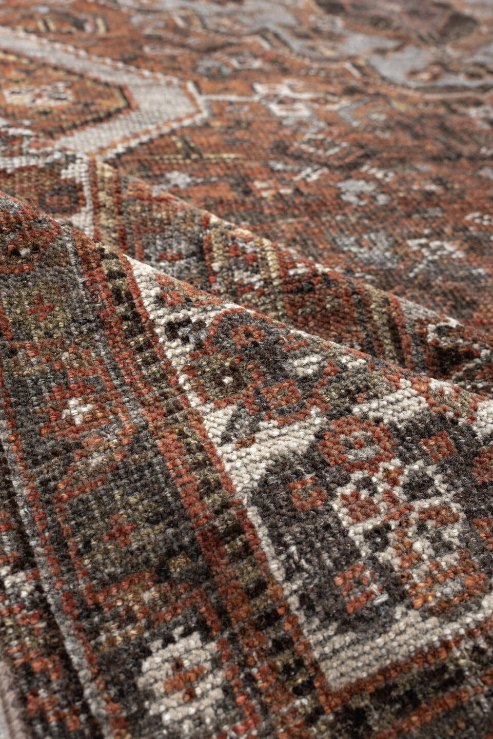5' x 7' one-of-a-kind handmade antique Shiraz medium size rug. Color palette: rust, brown, ivory, taupe, charcoal, camel