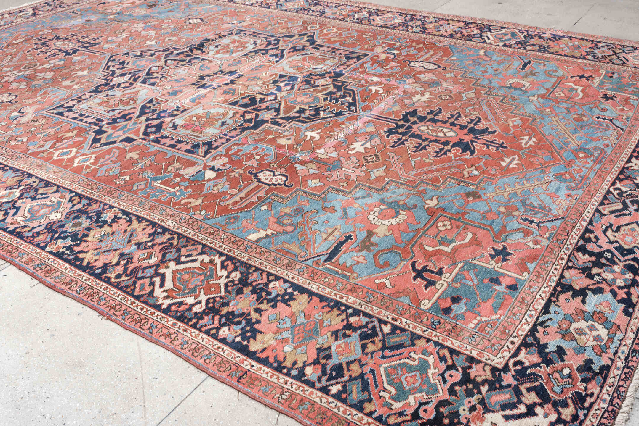 11' x 16' one-of-a-kind handmade vintage Heriz oversize rug. Color palette: terra cotta, navy, sky blue, ivory, rose, slate