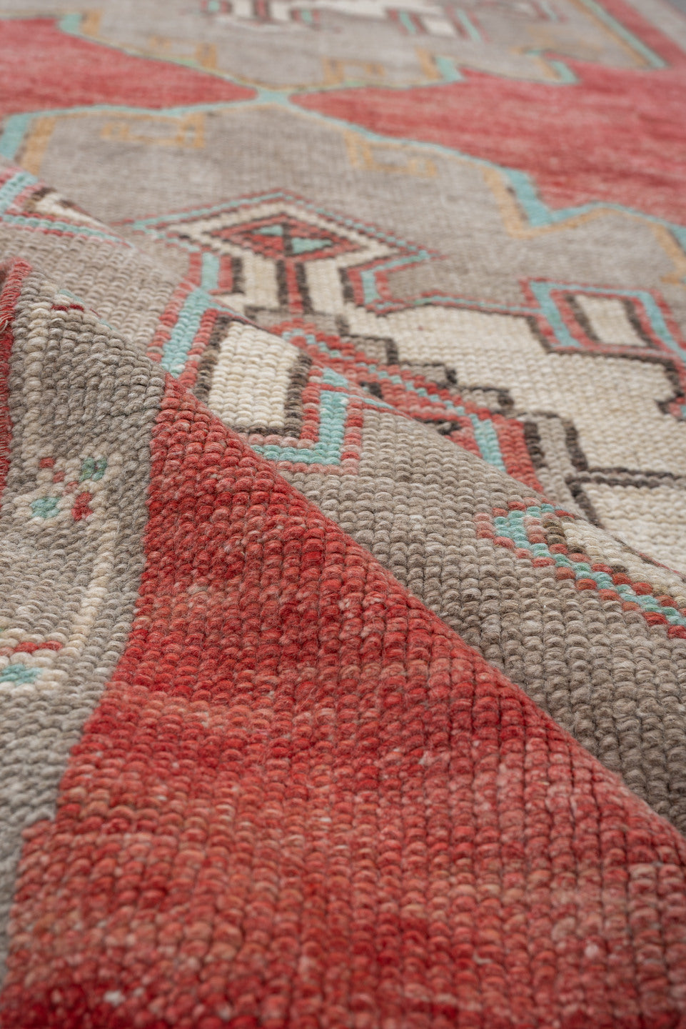 2' x 10' one-of-a-kind handmade vintage runner rug. Color palette: terracotta, ivory, taupe, aqua, rust, sage, brown, beige