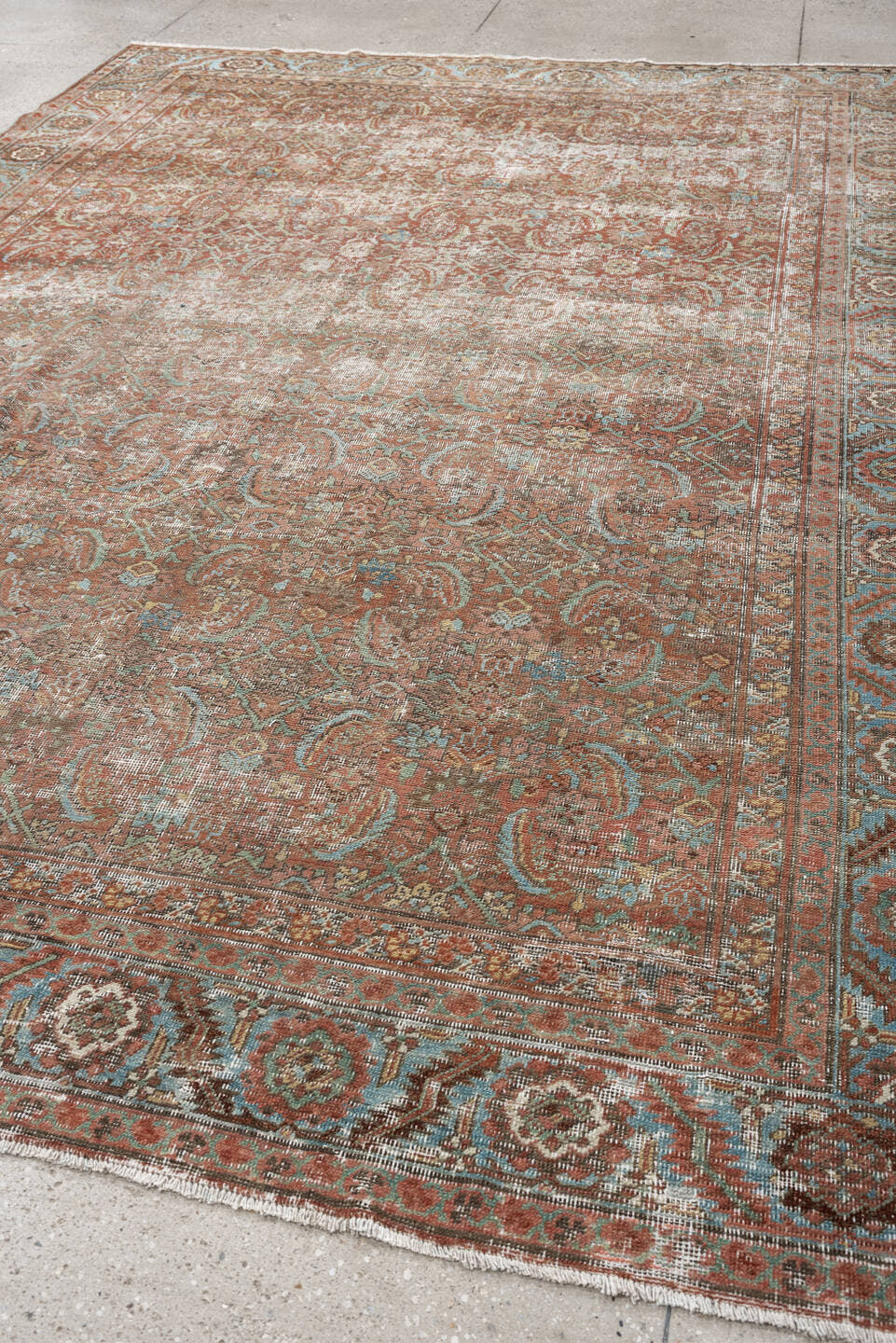 7' x 10' one-of-a-kind handmade vintage Bakhshayesh large size rug. Color palette: terracotta, sky blue, ivory, taupe, rust
