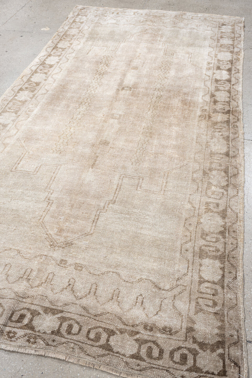 4' x 8' one-of-a-kind handmade vintage Anatolian runner rug. Color palette: ivory, taupe, beige, sand, light brown, gray