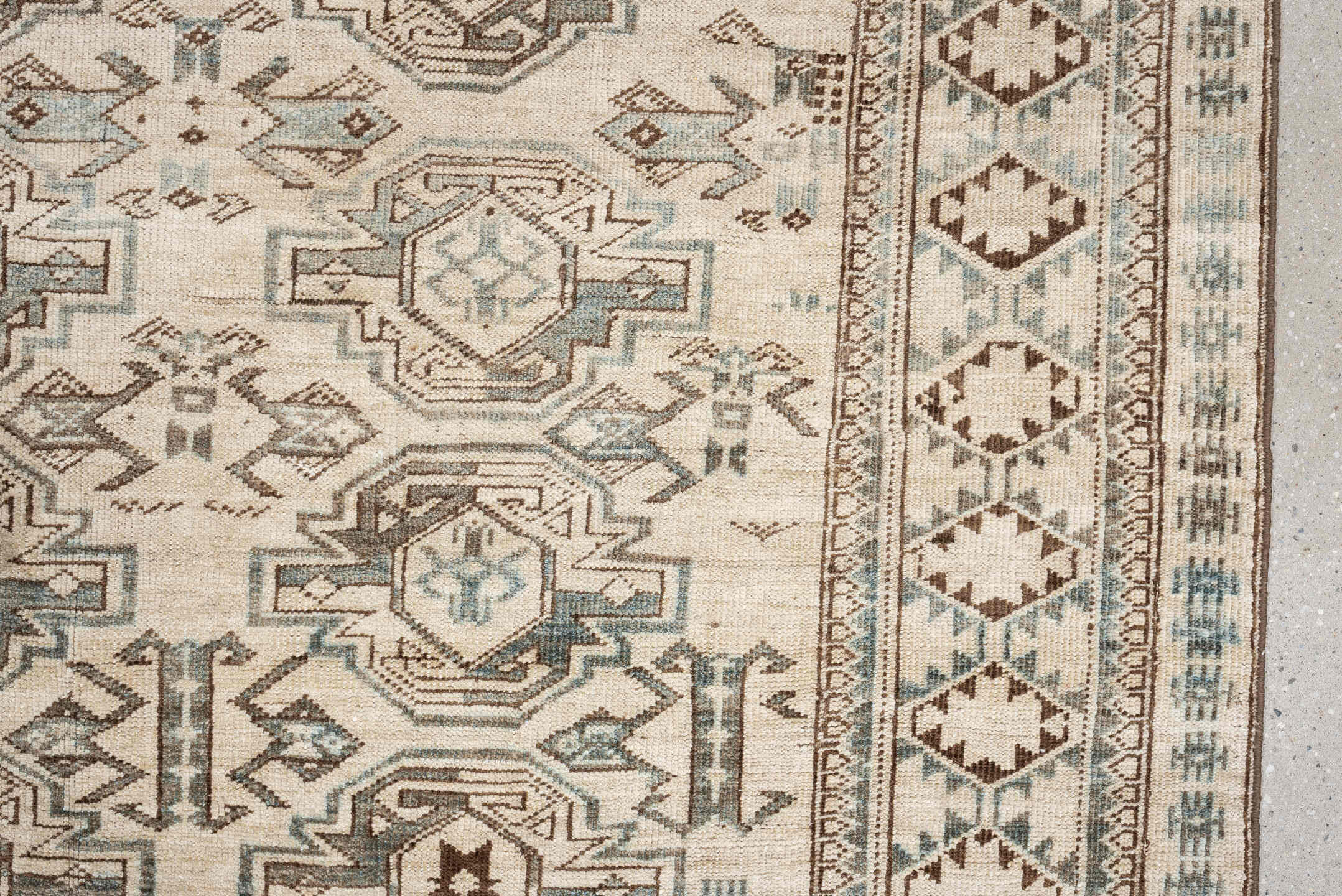 6' x 8' one-of-a-kind handmade vintage Belouch medium size rug. Color palette: ivory, taupe, brown, camel, pale blue, beige