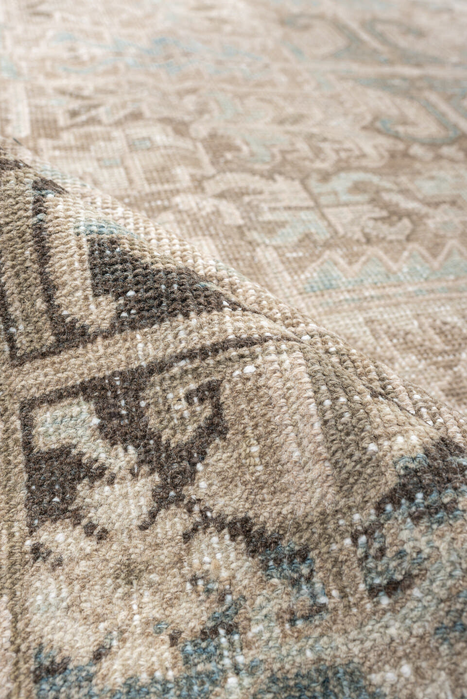 7' x 8' one-of-a-kind handmade vintage Heriz rug. Color palette: ivory, sky blue, taupe, charcoal, beige, brown, light blue