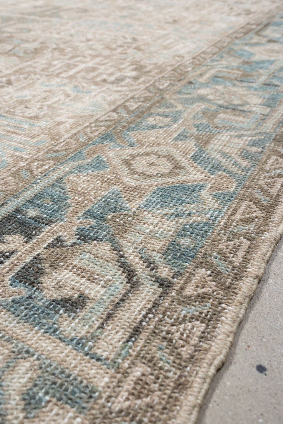 7' x 8' one-of-a-kind handmade vintage Heriz rug. Color palette: ivory, sky blue, taupe, charcoal, beige, brown, light blue