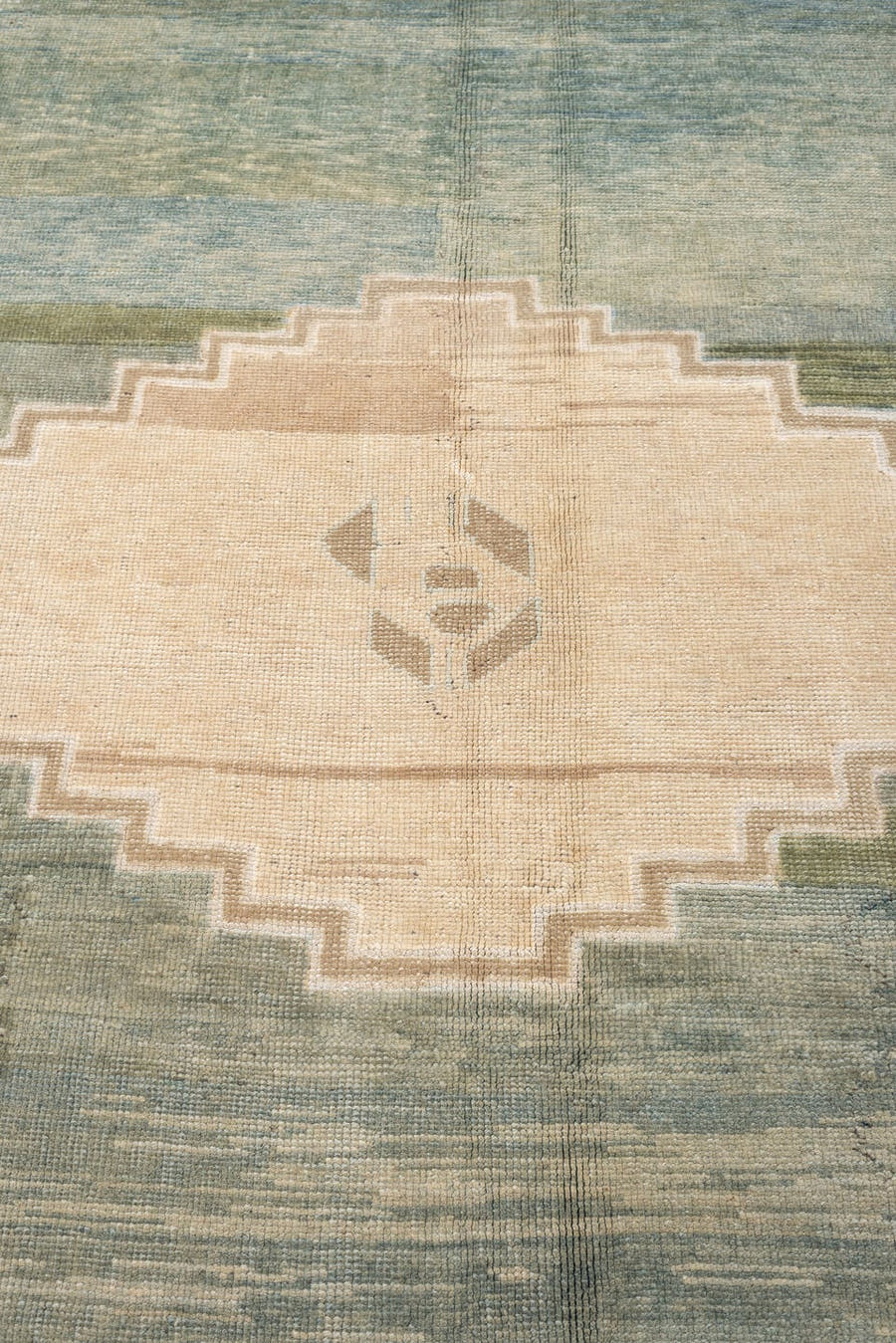 11' x 17' one-of-a-kind handmade vintage Gabbe oversize rug. Color palette: sage, ivory, sand, indigo, pale green, taupe
