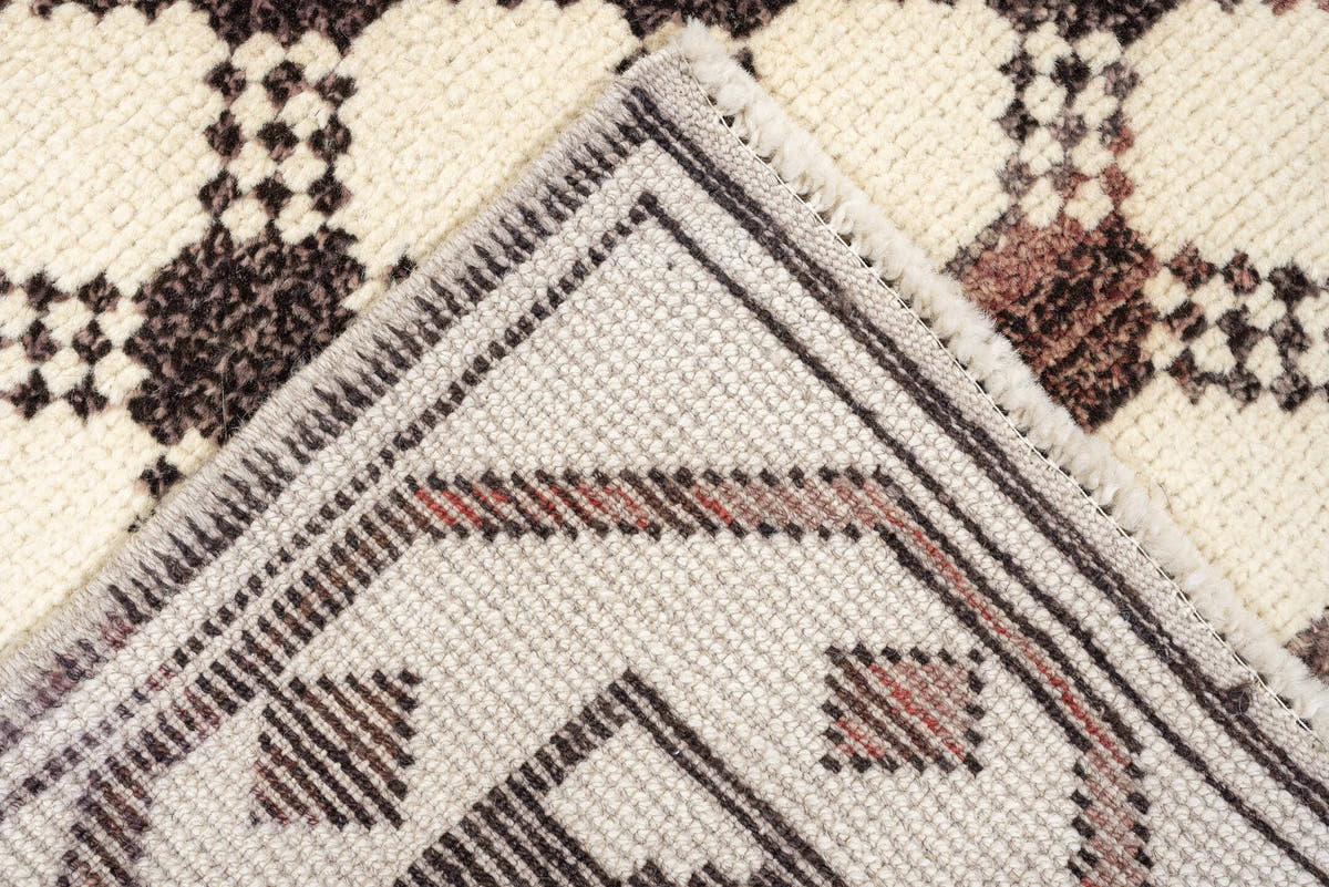 3' x 9' one-of-a-kind handmade vintage Kars runner rug. Color palette: ivory, brown, taupe, muted rose, charcoal, terracotta