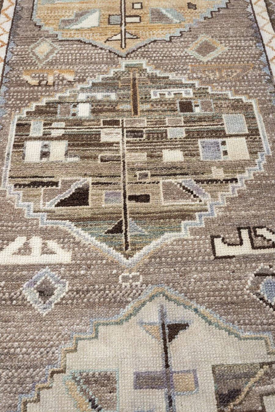 3' x 9' one-of-a-kind handmade vintage Kars runner rug. Color palette: taupe, ivory, charcoal, terracotta, blue gray, camel