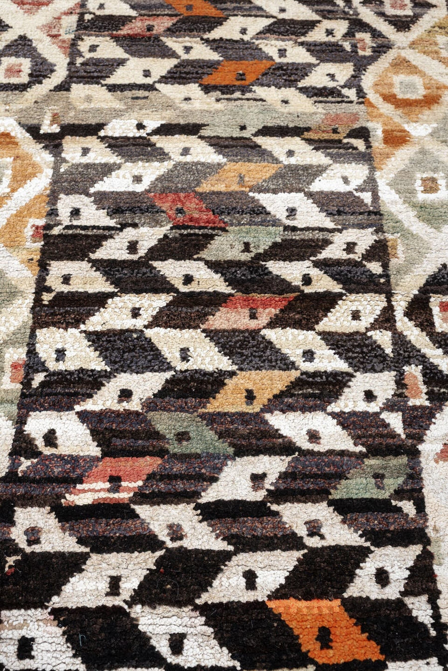 3' x 9' one-of-a-kind handmade vintage Kars runner rug. Color palette: dark brown, ivory, sage, rust, coral, taupe, charcoal