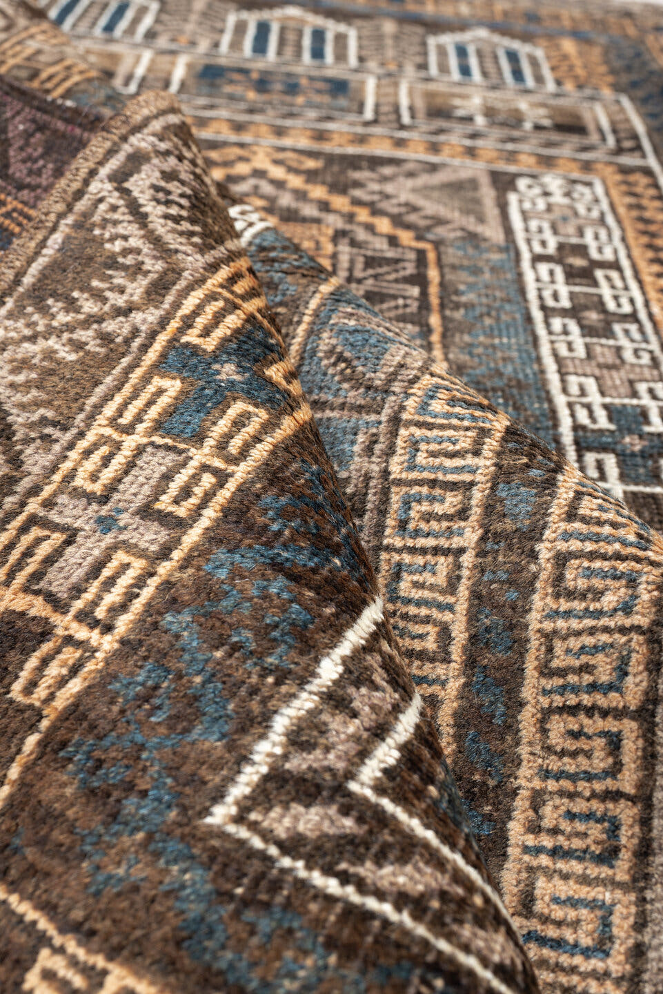 3' x 4' one-of-a-kind handmade antique Belouch small size rug. Color palette: brown, ivory, teal, peach, charcoal, taupe