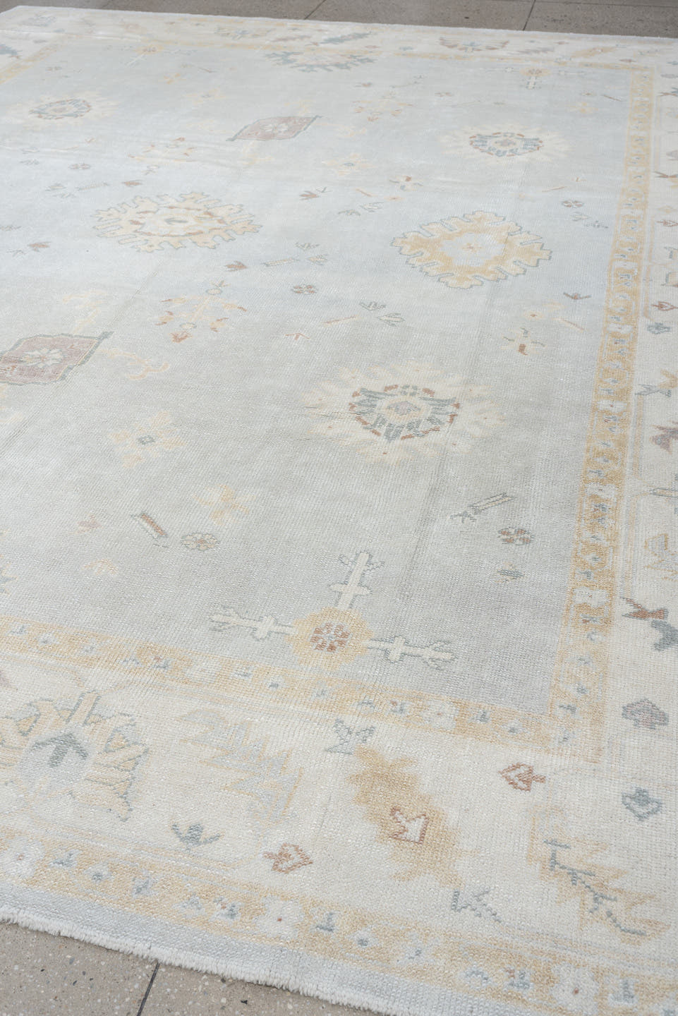 10' x 12' one-of-a-kind handmade vintage Oushak oversize rug. Color palette: blue gray, ivory, sage, dusty rose, terracotta
