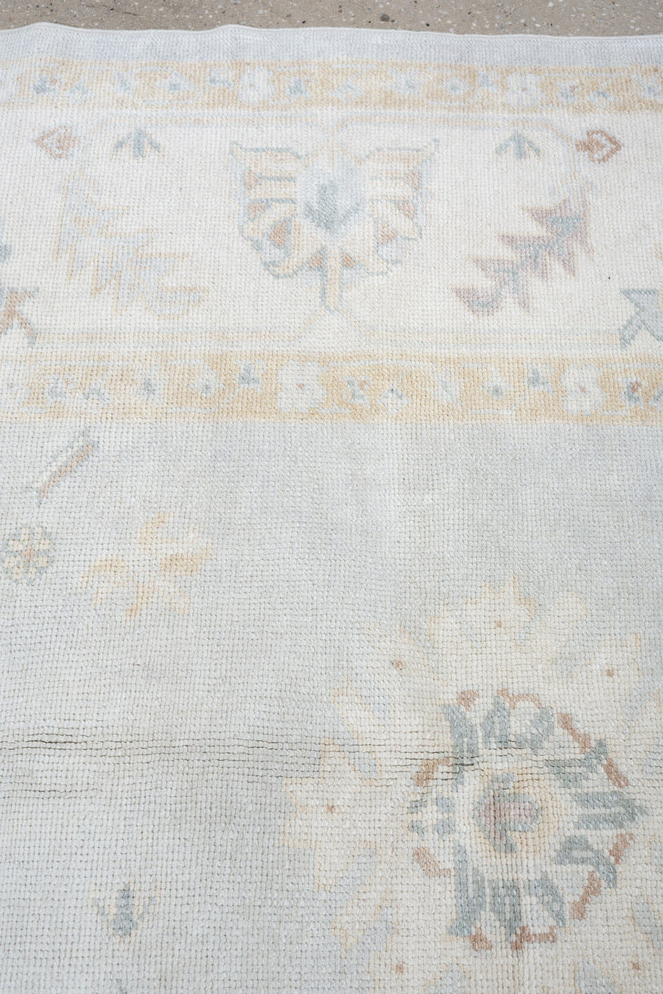 10' x 12' one-of-a-kind handmade vintage Oushak oversize rug. Color palette: blue gray, ivory, sage, dusty rose, terracotta