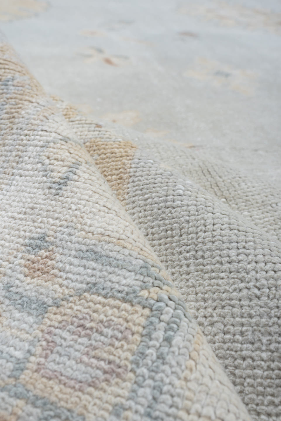 10' x 12' one-of-a-kind handmade vintage Oushak oversize rug. Color palette: blue gray, ivory, sage, dusty rose, terracotta