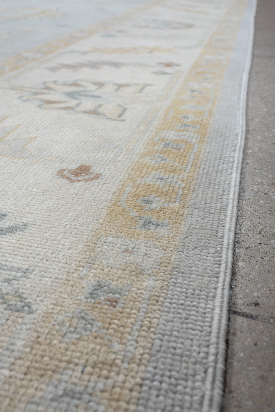 10' x 12' one-of-a-kind handmade vintage Oushak oversize rug. Color palette: blue gray, ivory, sage, dusty rose, terracotta