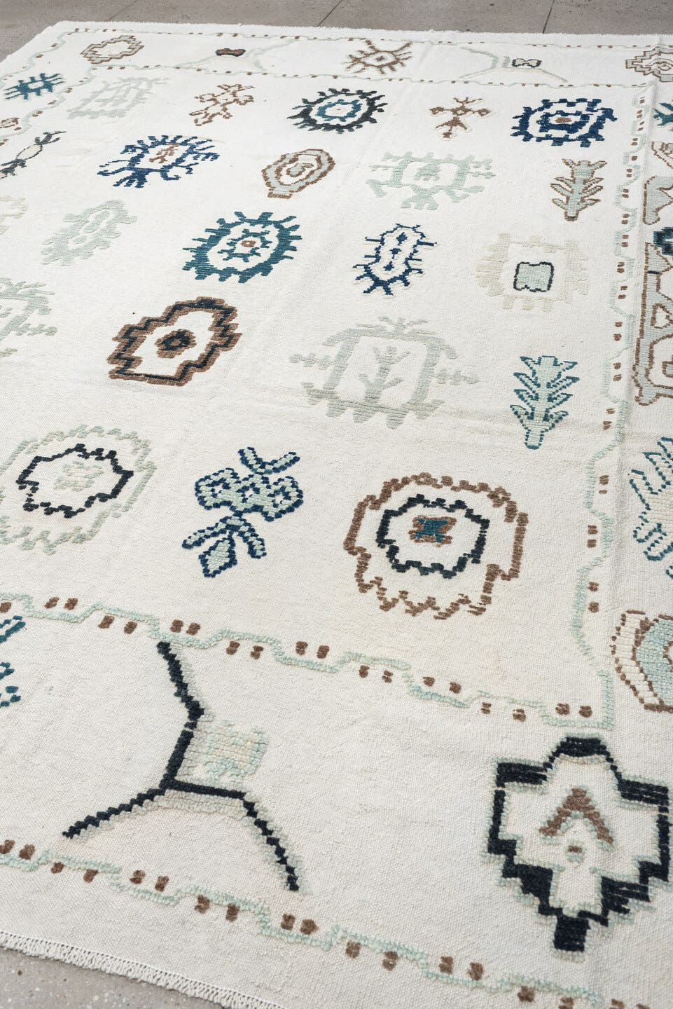 9' x 12' one-of-a-kind handmade vintage Kilim large size rug. Color palette: ivory, pale sage, teal, navy, warm brown