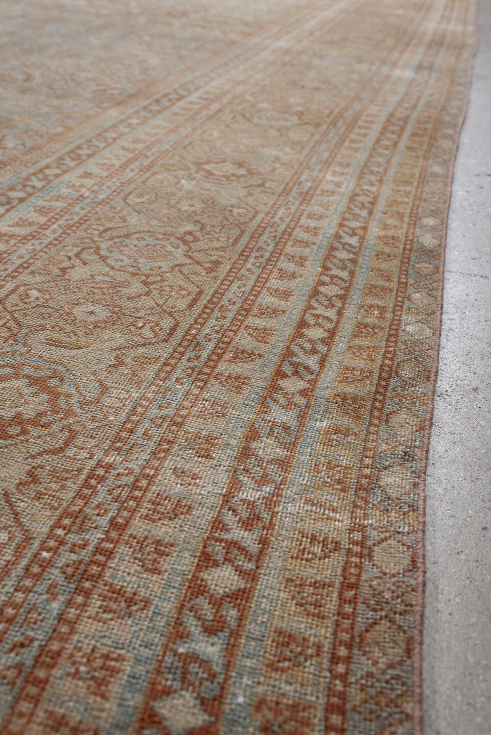 10' x 13' one-of-a-kind handmade antique Tabriz oversize rug. Color palette: ivory, pale blue, terracotta, taupe, sage