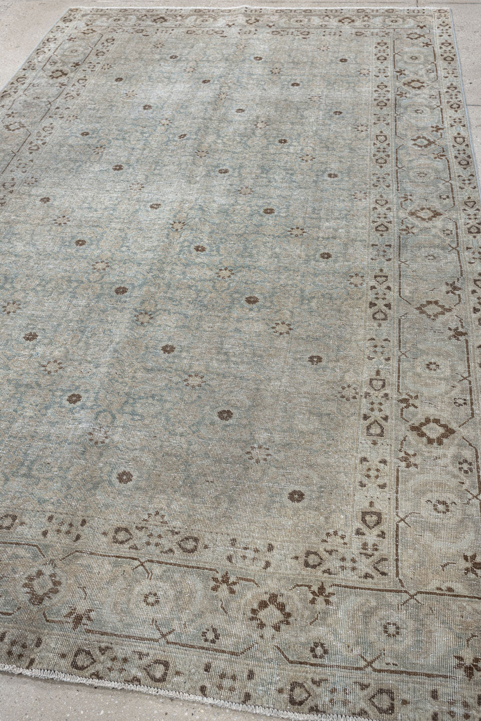 5' x 9' one-of-a-kind handmade antique Tabriz medium size rug. Color palette: blue gray, ivory, taupe, brown, charcoal