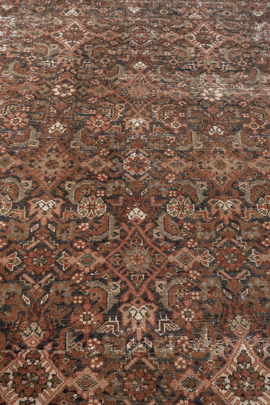 7' x 10' one-of-a-kind handmade antique Malayer large size rug. Color palette: walnut brown, rust, ivory, charcoal