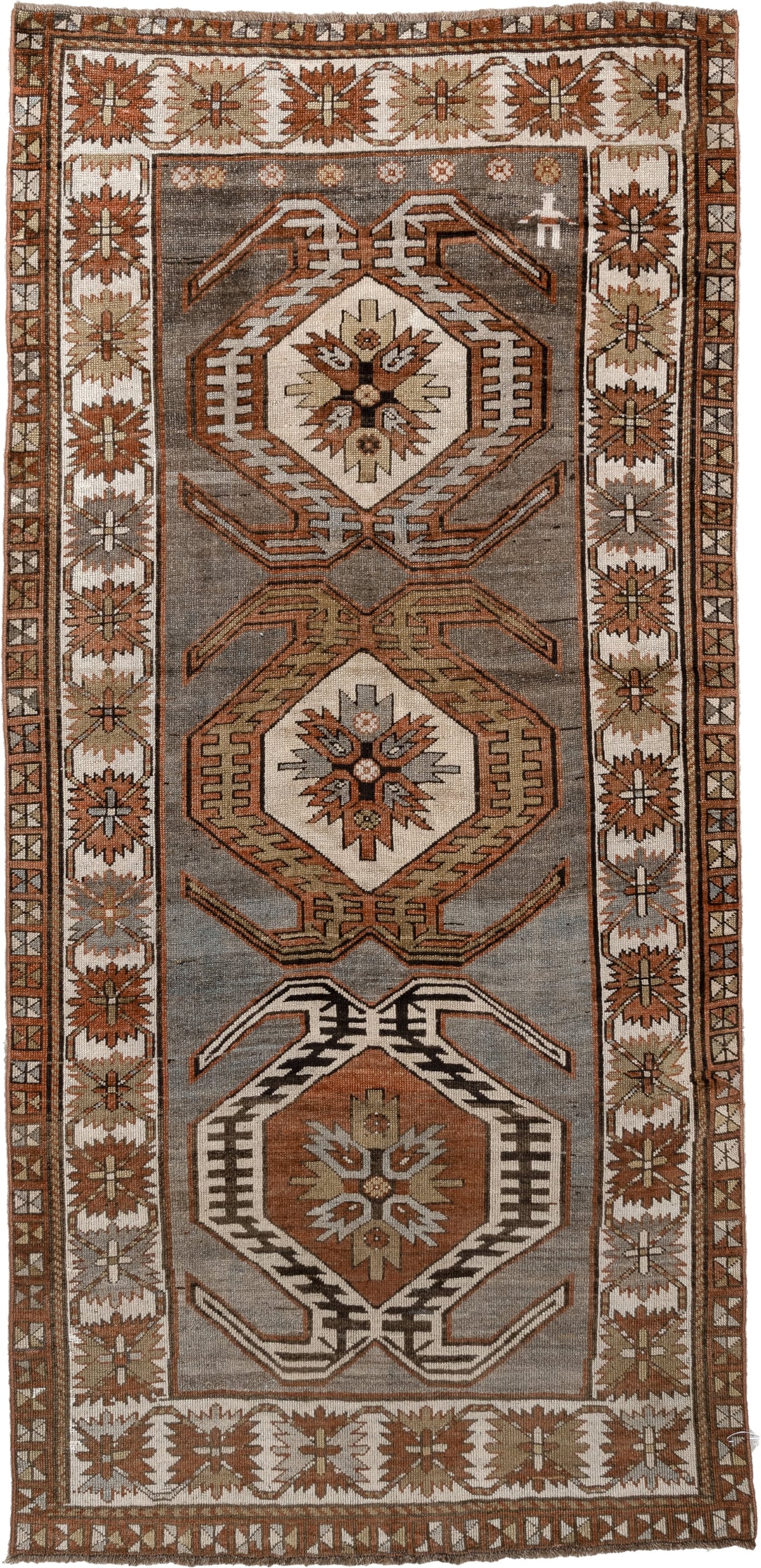 3' x 7' one-of-a-kind handmade antique Caucasian runner rug. Color palette: charcoal, ivory, rust, taupe, dark brown, camel