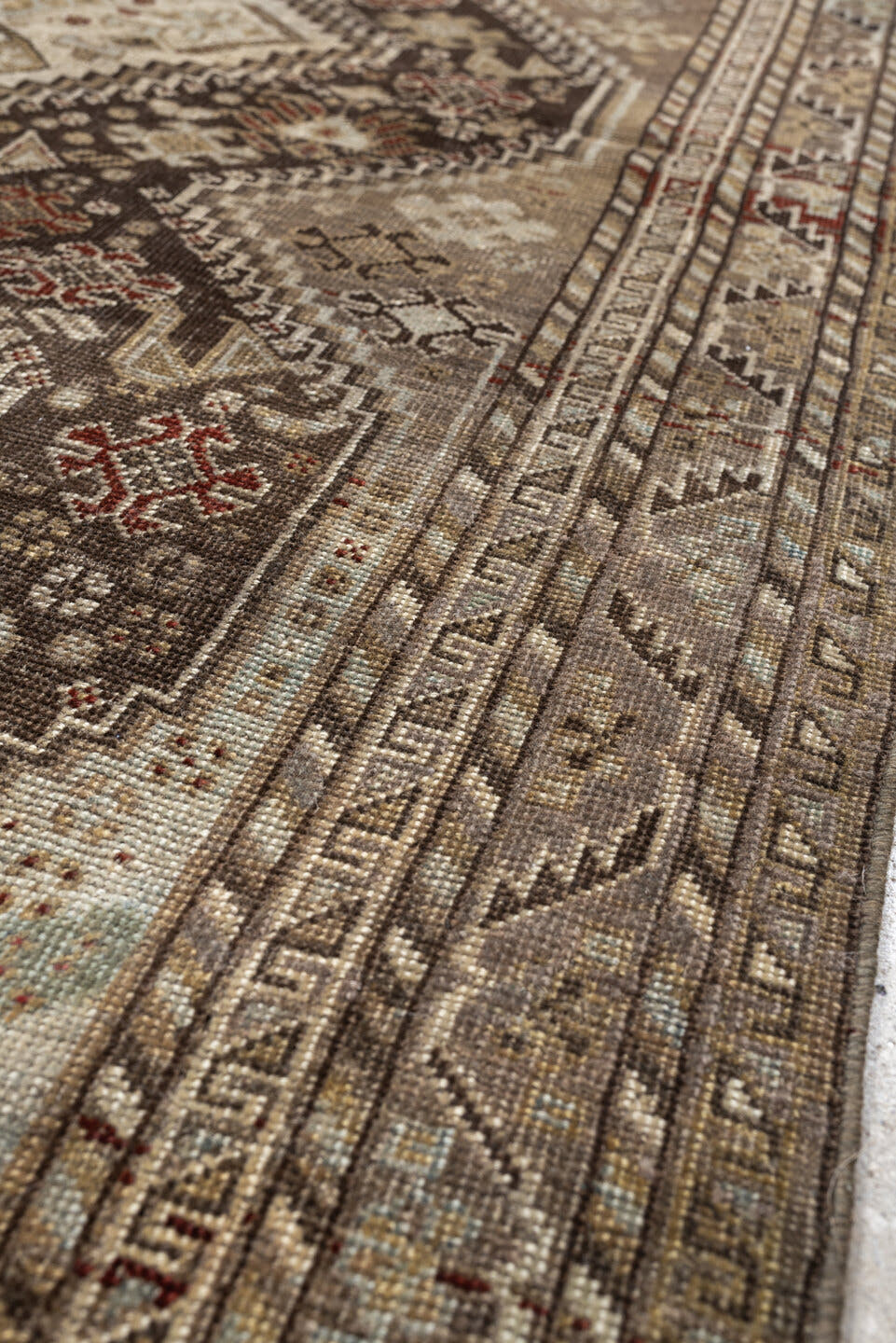 3' x 5' one-of-a-kind handmade antique Shiraz small size rug. Color palette: taupe, charcoal, ivory, camel, brown, rust