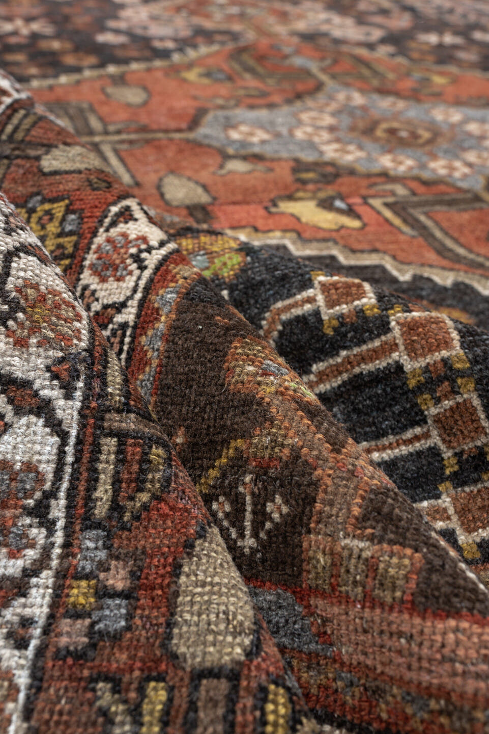 4' x 5' one-of-a-kind handmade antique Bakhshayesh rug. Color palette: charcoal, terracotta, ivory, rust, sage, gold
