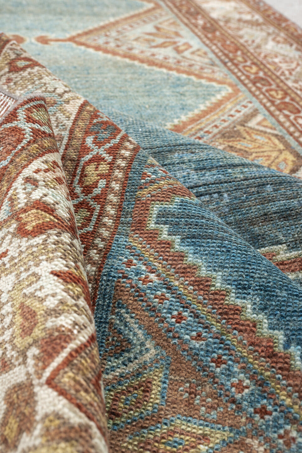 3' x 9' one-of-a-kind handmade antique Kurd runner rug. Color palette: teal, ivory, rust, slate, terracotta, taupe, charcoal