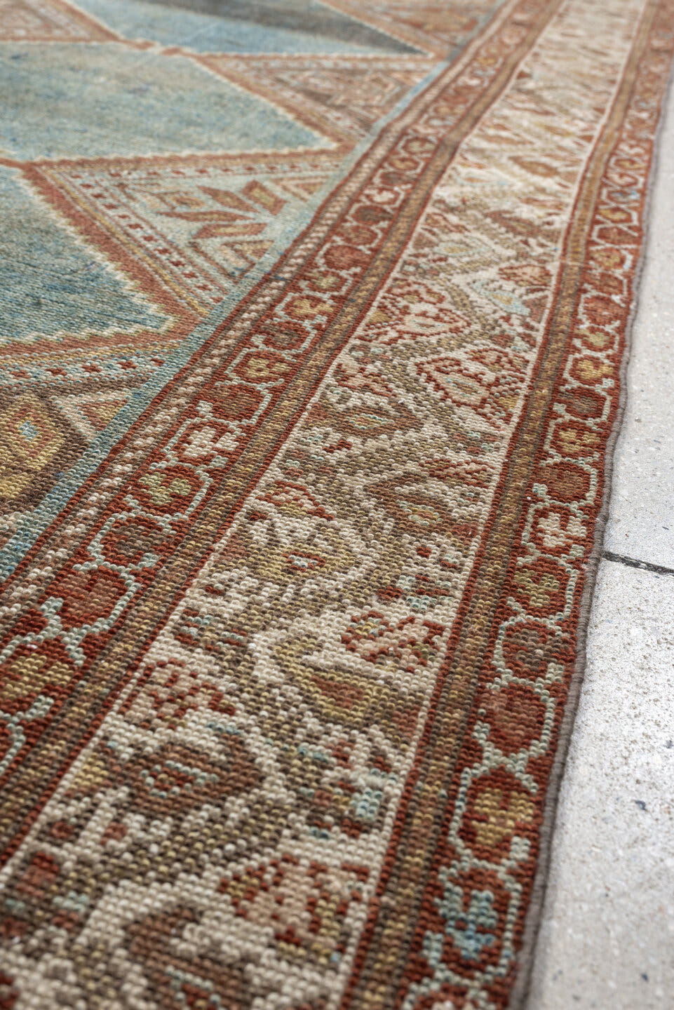 3' x 9' one-of-a-kind handmade antique Kurd runner rug. Color palette: teal, ivory, rust, slate, terracotta, taupe, charcoal
