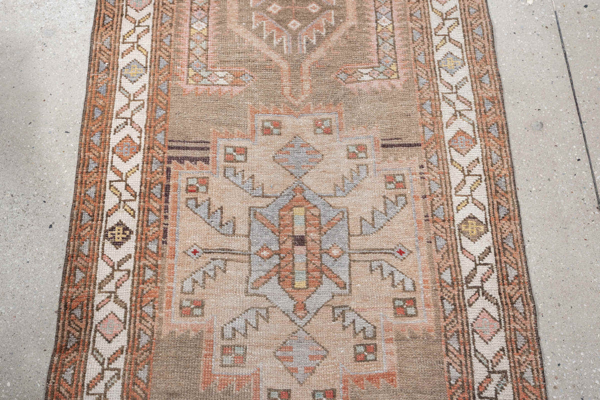2' x 13' one-of-a-kind handmade antique Kurd runner rug. Color palette: taupe, ivory, terra cotta, charcoal, blue gray, rose