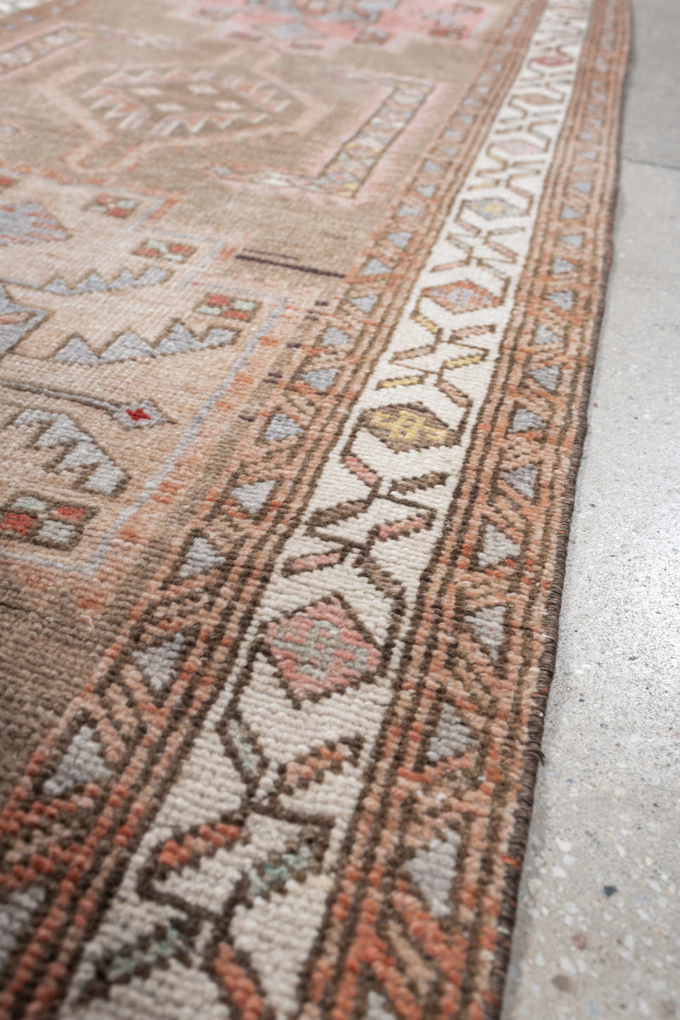 2' x 13' one-of-a-kind handmade antique Kurd runner rug. Color palette: taupe, ivory, terra cotta, charcoal, blue gray, rose