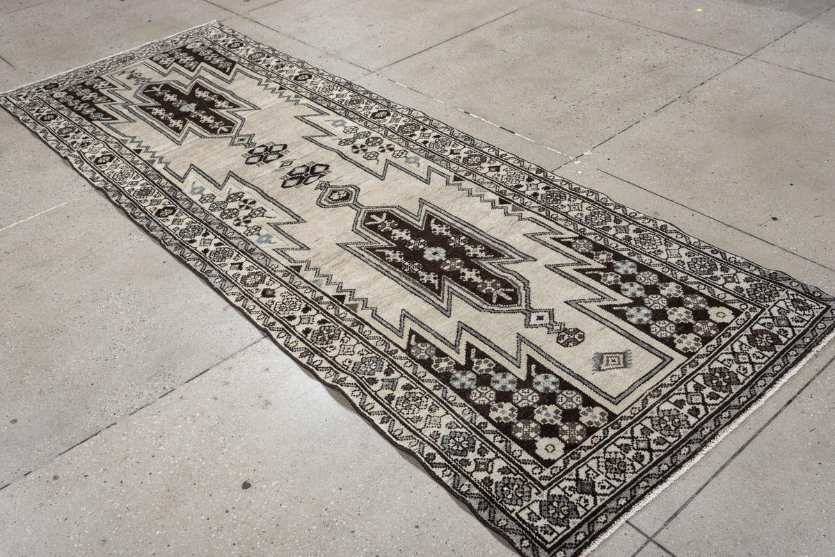 3' x 9' one-of-a-kind handmade antique Mazlagan runner rug. Color palette: ivory, dark brown, charcoal, taupe, soft gray