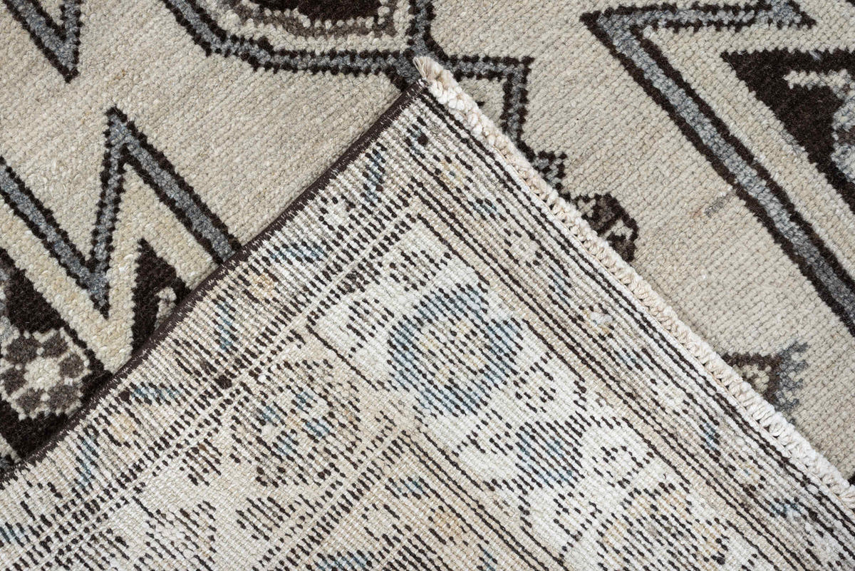 3' x 9' one-of-a-kind handmade antique Mazlagan runner rug. Color palette: ivory, dark brown, charcoal, taupe, soft gray