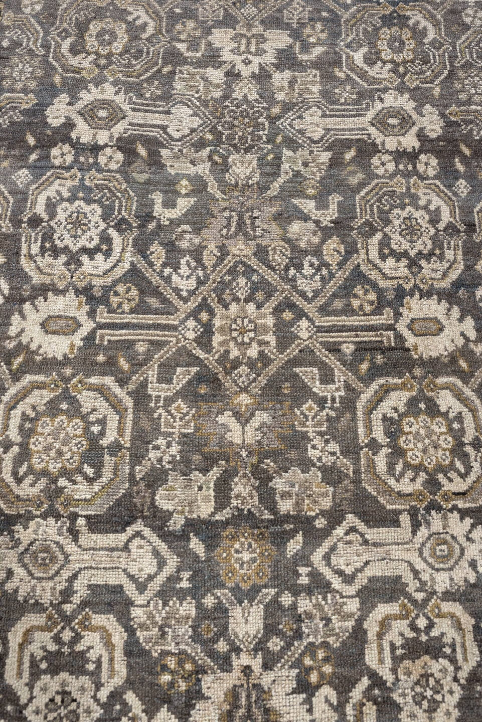 4' x 7' one-of-a-kind handmade antique Malayer rug. Color palette: charcoal, ivory, taupe, ochre, camel, ebony, slate, black
