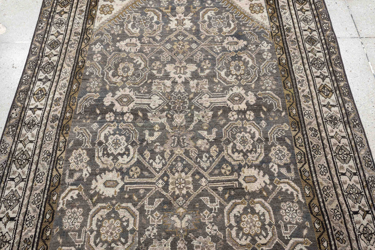 4' x 7' one-of-a-kind handmade antique Malayer rug. Color palette: charcoal, ivory, taupe, ochre, camel, ebony, slate, black