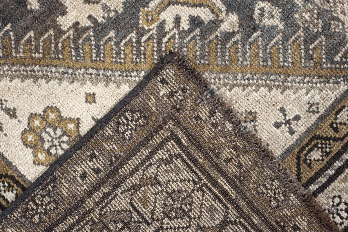 4' x 7' one-of-a-kind handmade antique Malayer rug. Color palette: charcoal, ivory, taupe, ochre, camel, ebony, slate, black