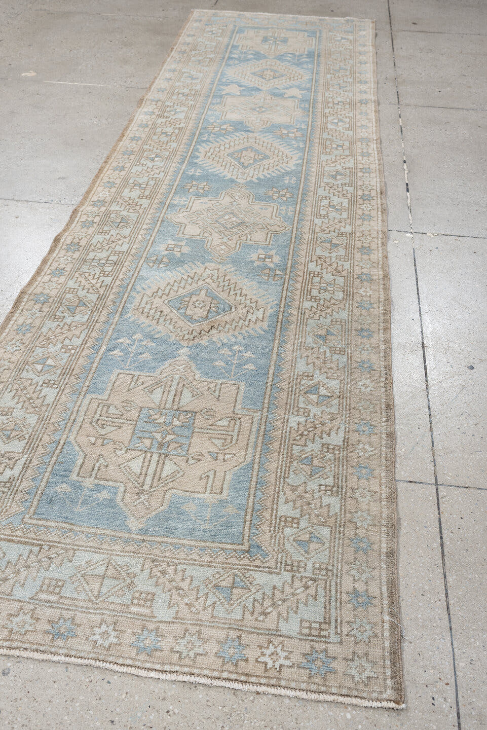 3' x 11' one-of-a-kind handmade antique Heriz runner rug. Color palette: sky blue, ivory, taupe, beige, camel, slate, brown