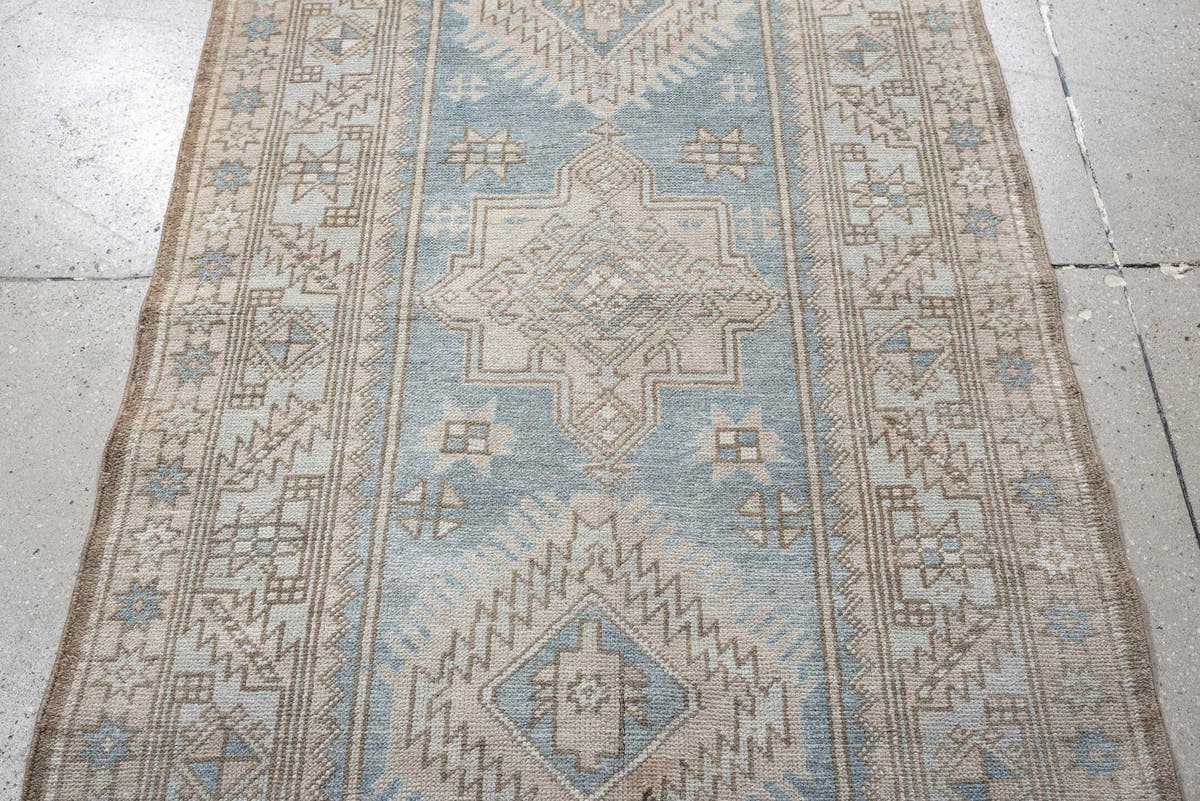 3' x 11' one-of-a-kind handmade antique Heriz runner rug. Color palette: sky blue, ivory, taupe, beige, camel, slate, brown