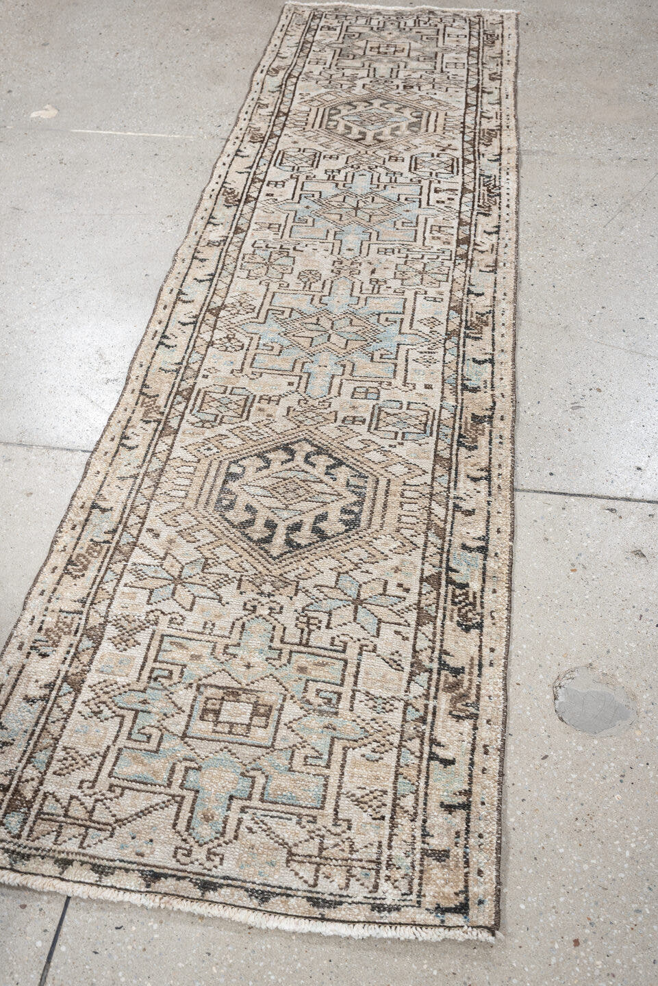 2' x 7' one-of-a-kind handmade antique Karaje runner rug. Color palette: ivory, pale blue, taupe, brown, charcoal, beige