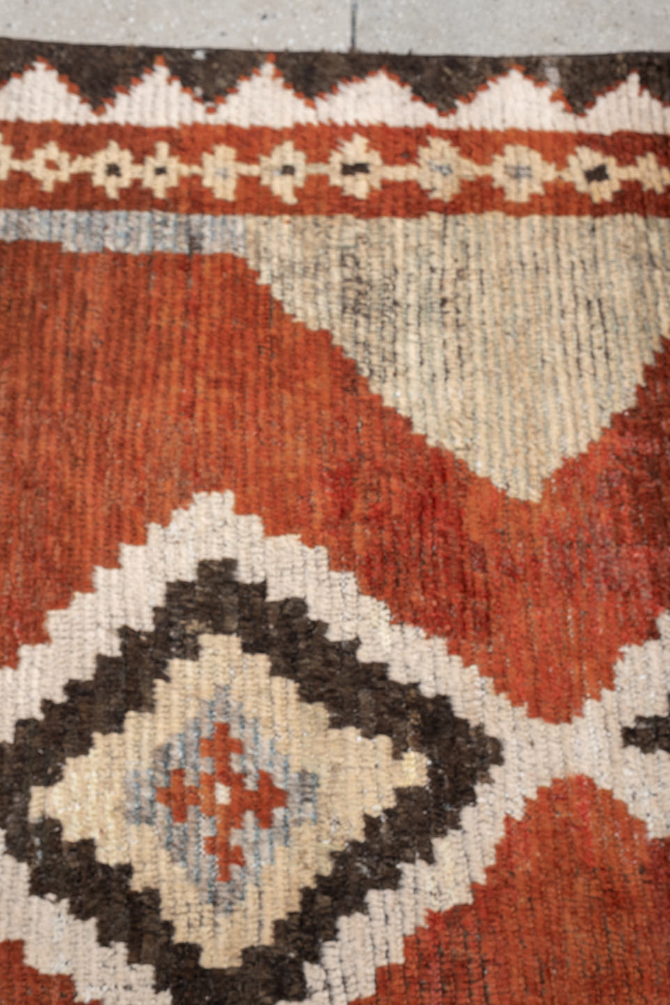 4' x 7' one-of-a-kind handmade antique Gabbe rug. Color palette: rust, ivory, gray, dark brown, cream, charcoal, terracotta