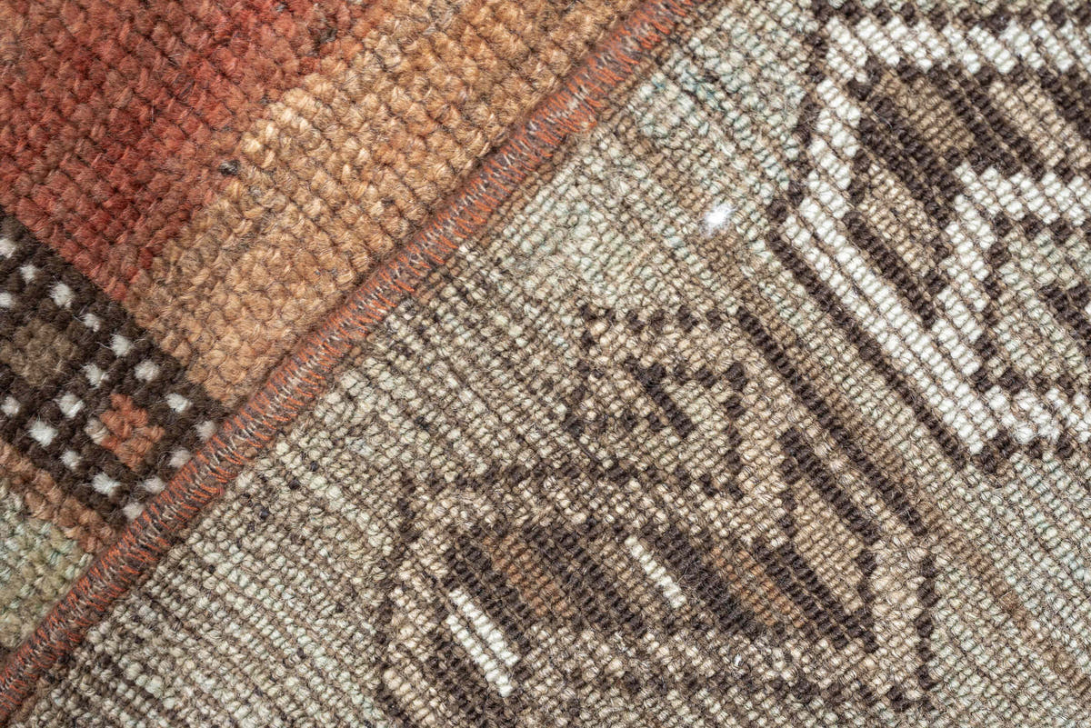3' x 10' one-of-a-kind handmade antique Kurd runner rug. Color palette: rust, terra cotta, pale blue, taupe, ivory, sage