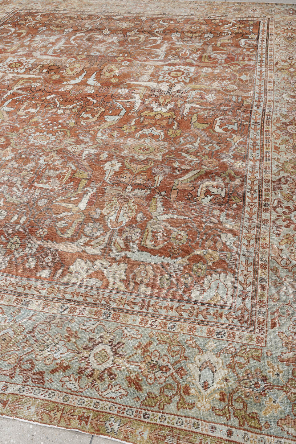 9' x 11' one-of-a-kind handmade antique Mahal large size rug. Color palette: terracotta, rust, ivory, pale blue, sage, taupe