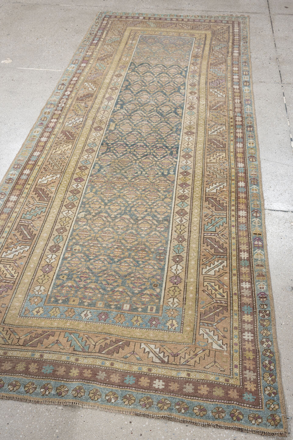 3' x 8' one-of-a-kind handmade antique Kurd runner rug. Color palette: blue gray, ivory, taupe, dusty rose, muted teal, sage