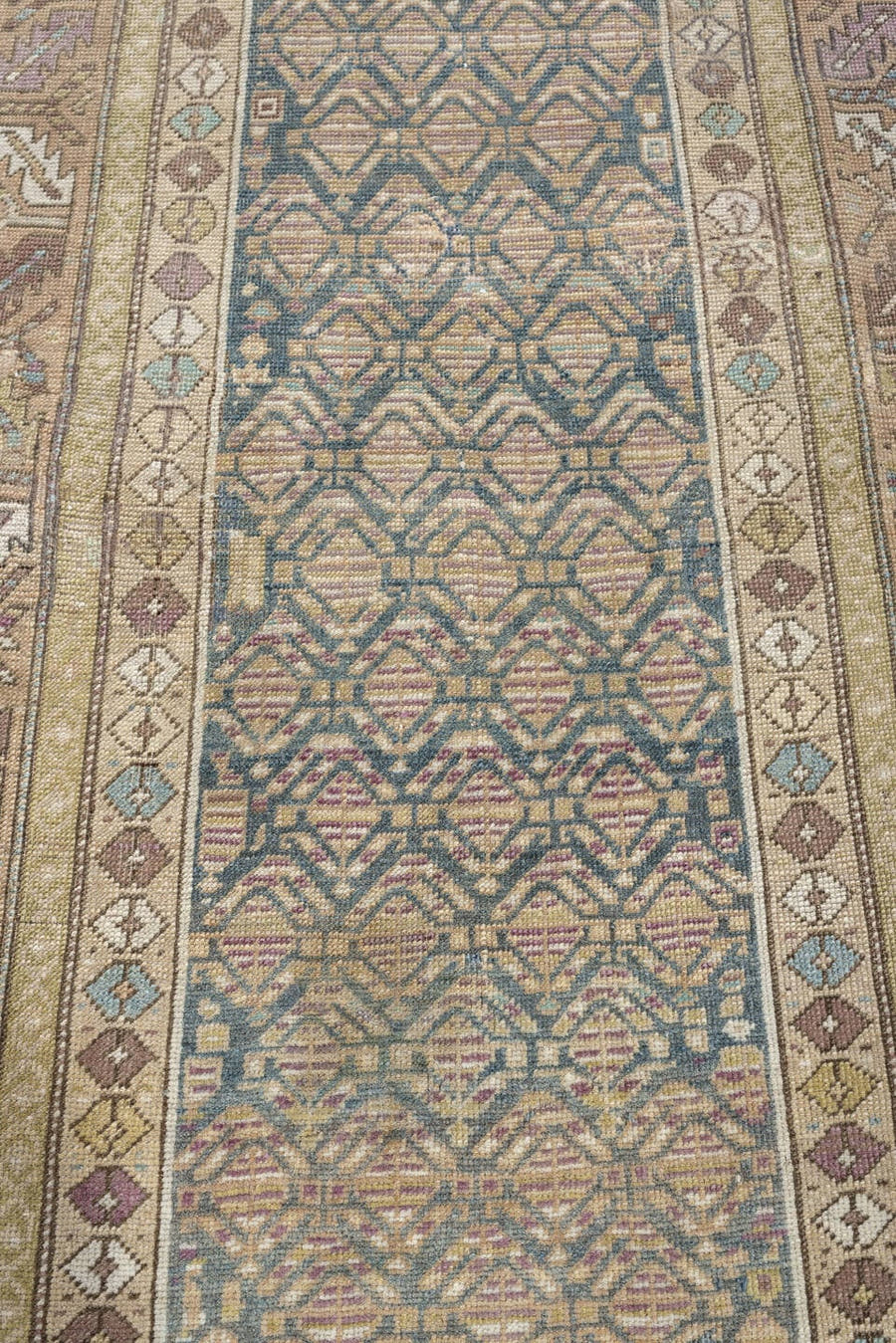 3' x 8' one-of-a-kind handmade antique Kurd runner rug. Color palette: blue gray, ivory, taupe, dusty rose, muted teal, sage