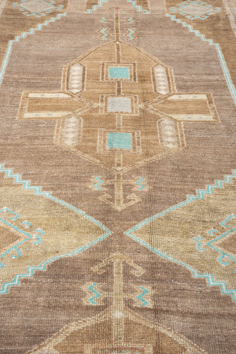 6' x 12' one-of-a-kind handmade antique Kars large size rug. Color palette: taupe, ivory, camel, turquoise, fuchsia, peach