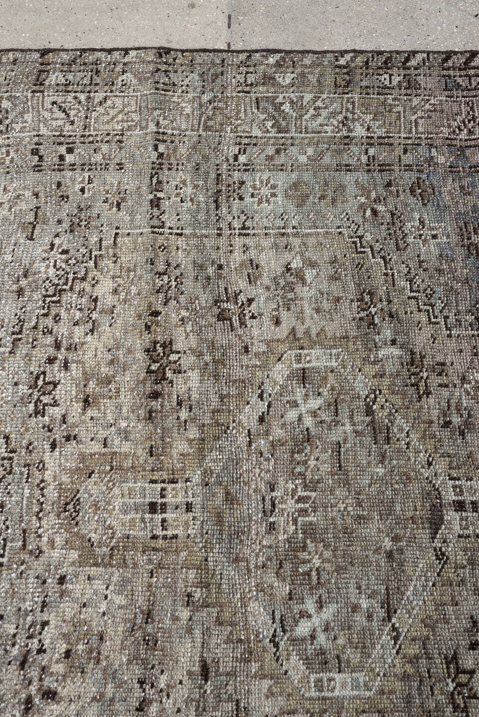 5' x 6' one-of-a-kind handmade antique Shiraz rug. Color palette: taupe, ivory, charcoal, blue gray, brown, slate, beige