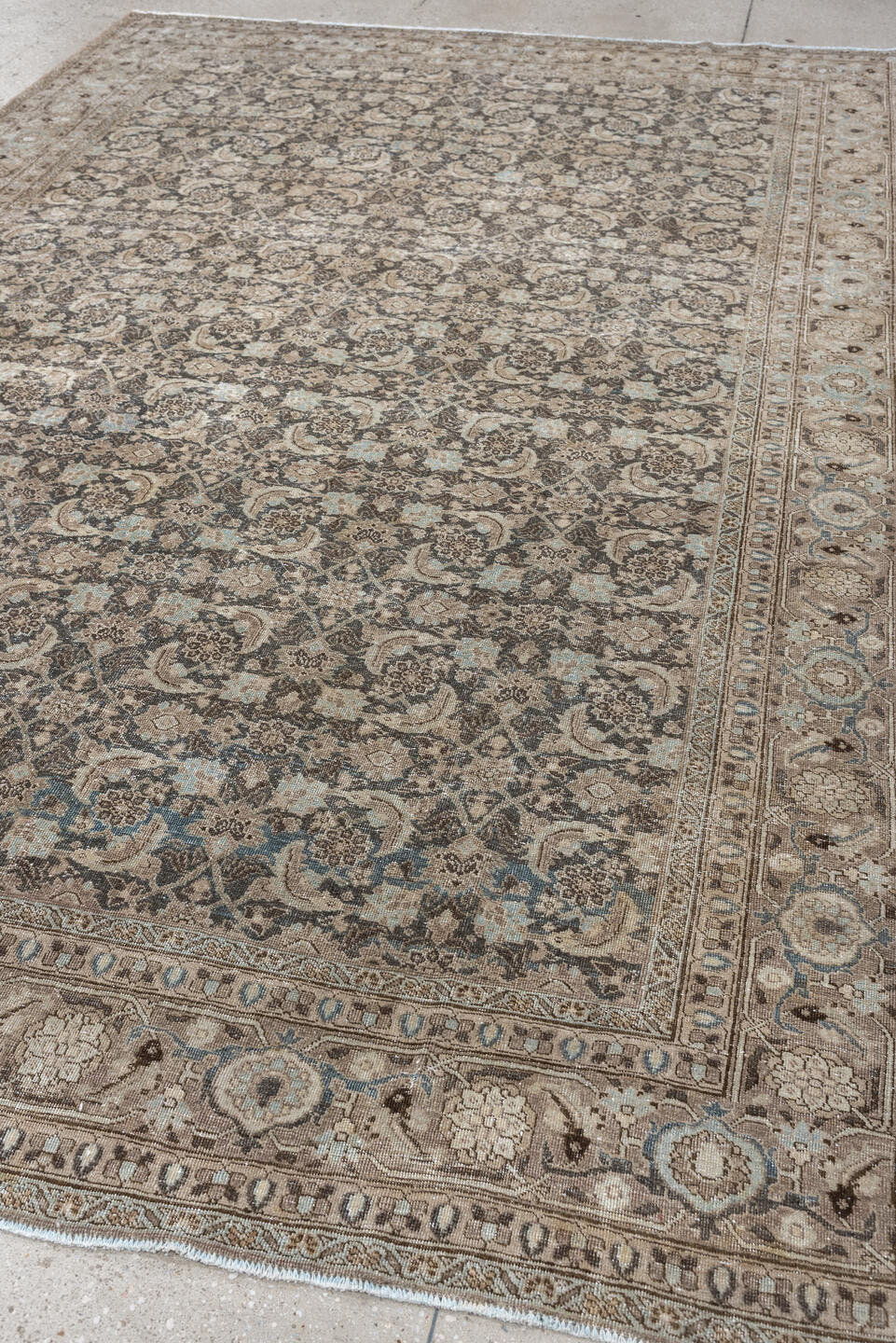 7' x 10' one-of-a-kind handmade antique Tabriz large size rug. Color palette: taupe, ivory, charcoal, pale blue, brown
