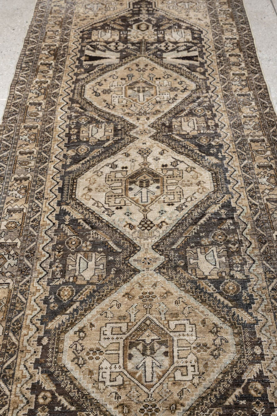 3' x 9' one-of-a-kind handmade antique Afshar runner rug. Color palette: ivory, charcoal, taupe, brown, camel, slate, ebony