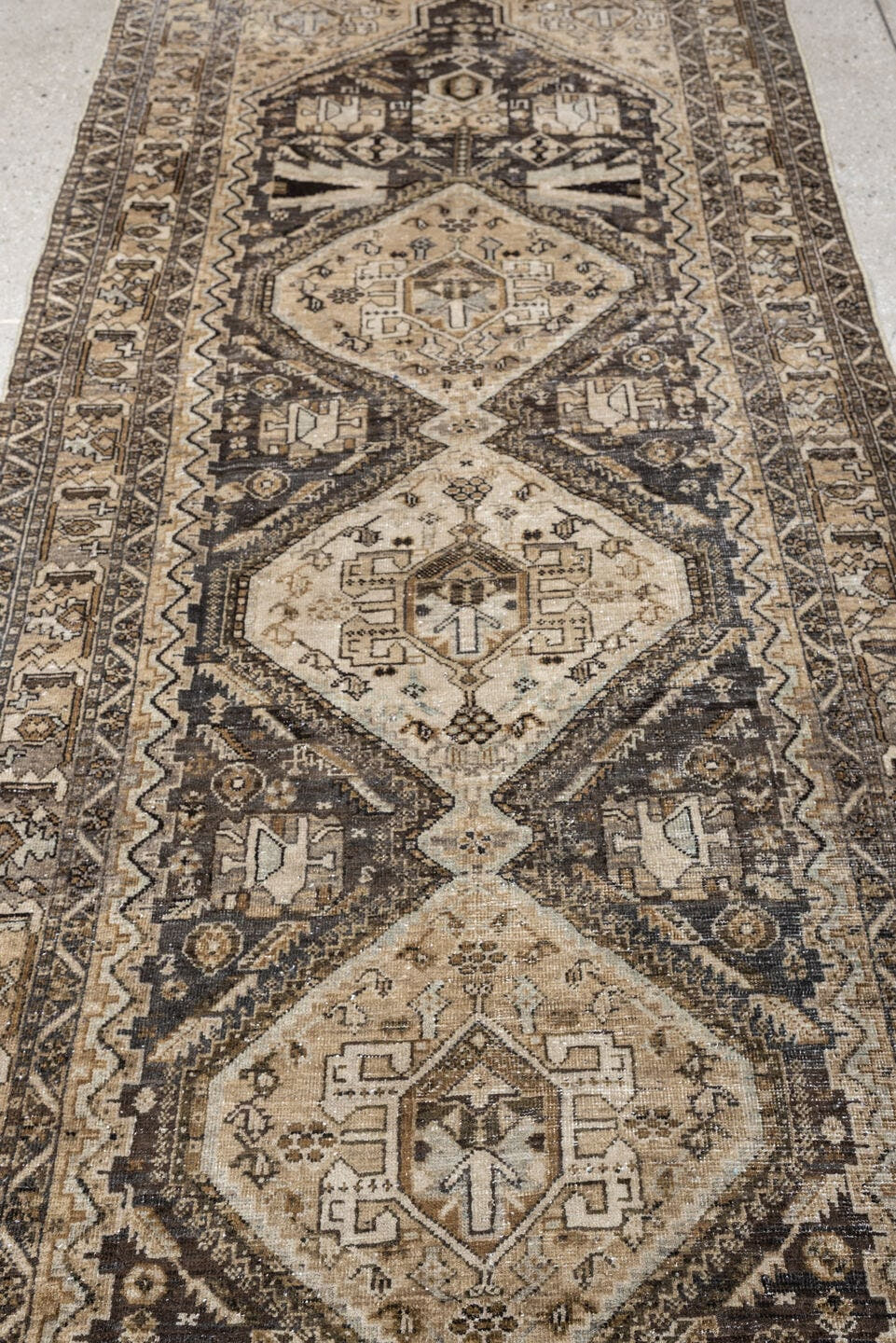 3' x 9' one-of-a-kind handmade antique Afshar runner rug. Color palette: ivory, charcoal, taupe, brown, camel, slate, ebony