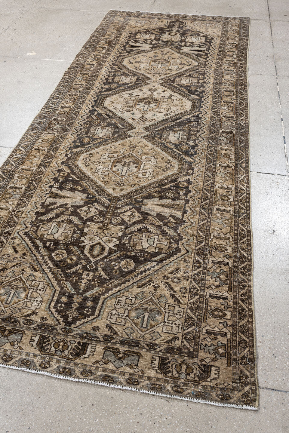 3' x 9' one-of-a-kind handmade antique Afshar runner rug. Color palette: ivory, charcoal, taupe, brown, camel, slate, ebony