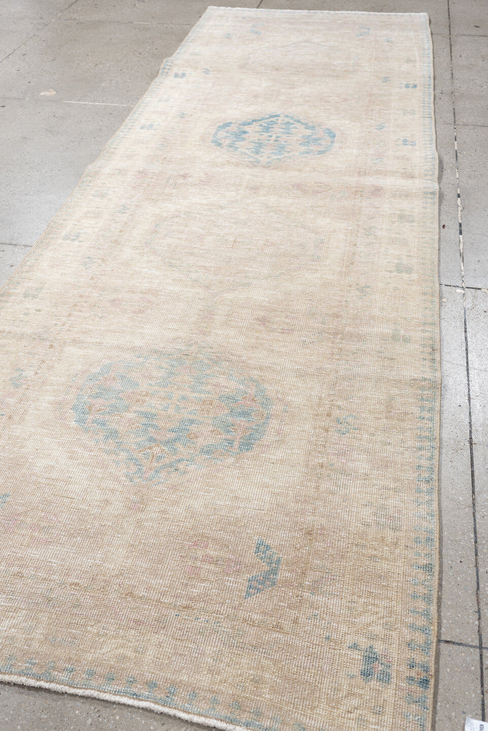 3' x 10' one-of-a-kind handmade antique Sarab runner rug. Color palette: ivory, pale blue, blush, beige, taupe, light blue
